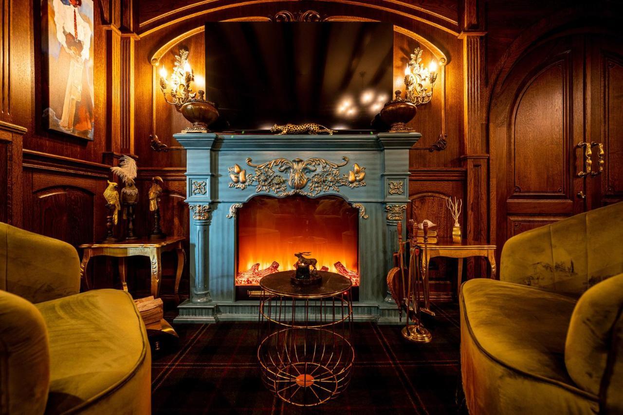 Casa Timis - Wellness & Spa Resort Chitorani Esterno foto The fireplace in the living room
