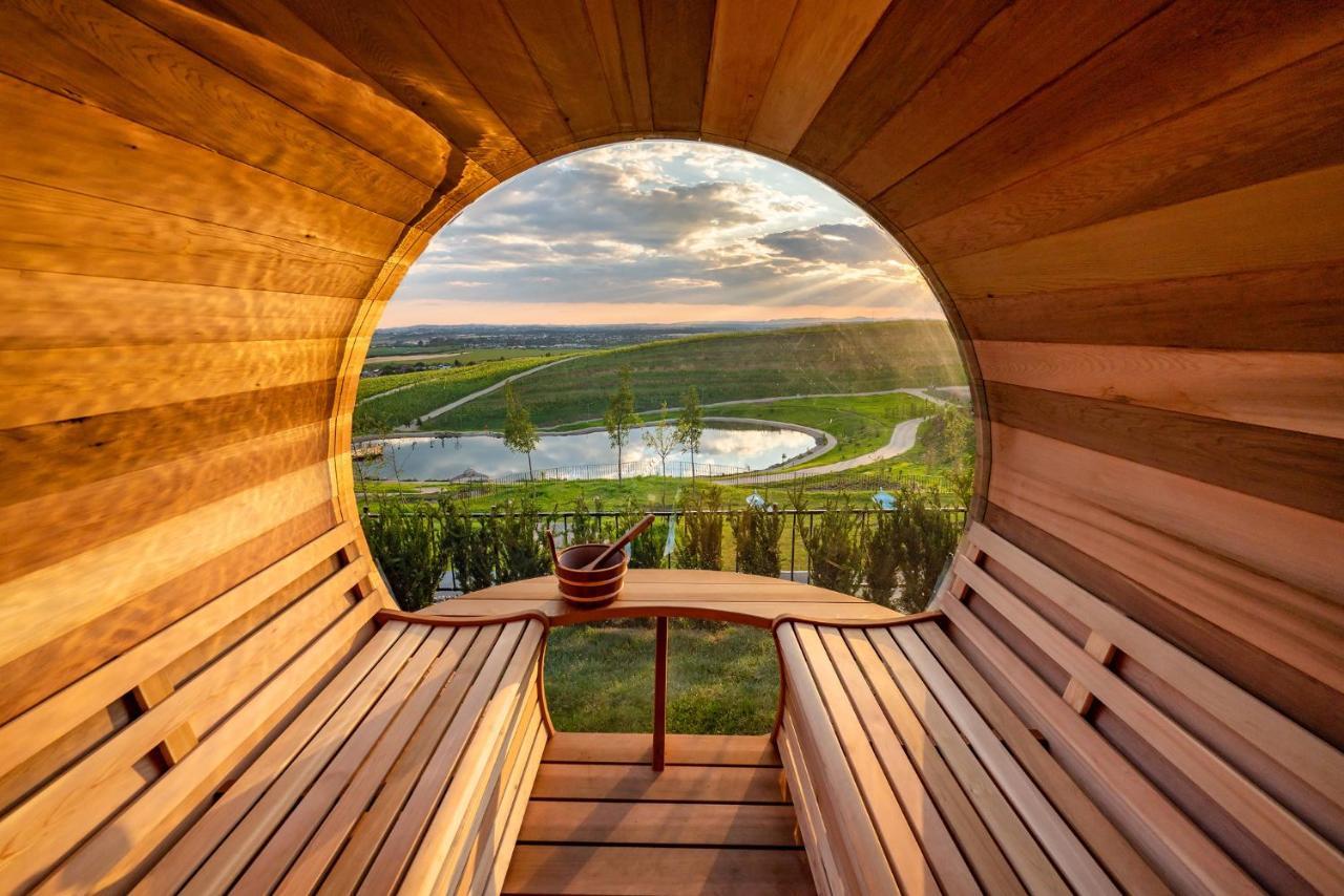 Casa Timis - Wellness & Spa Resort Chitorani Esterno foto The view from the barrel sauna
